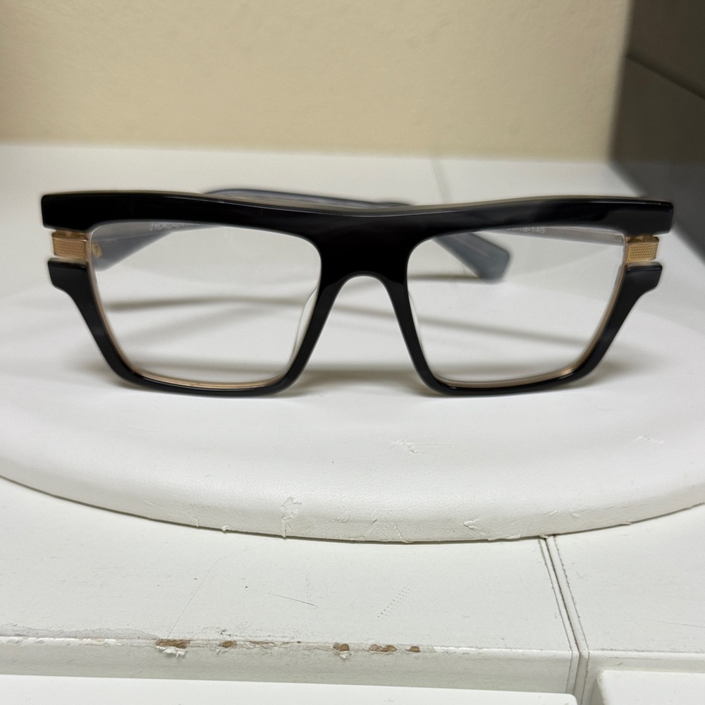 Black and Gold Rectangular Glasses
Iyoko Inyake 852
Never worn-old stock